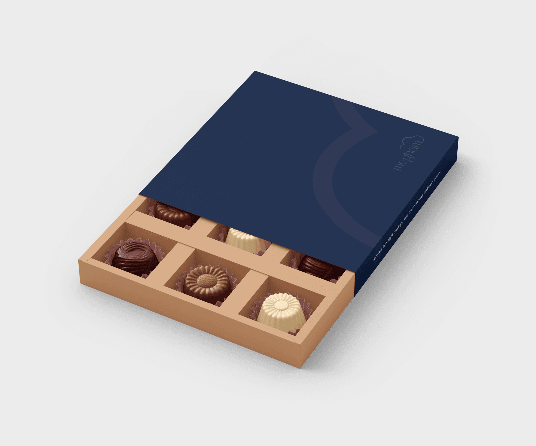 An open MEGHAM gift box revealing filled chocolate cavities